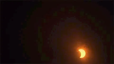 Cloudy View of the Eclipse Stock Photos
