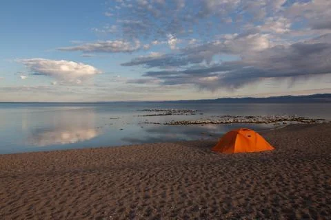 Cloudy view on a mountain lake. Mongolia tent Stock Photos