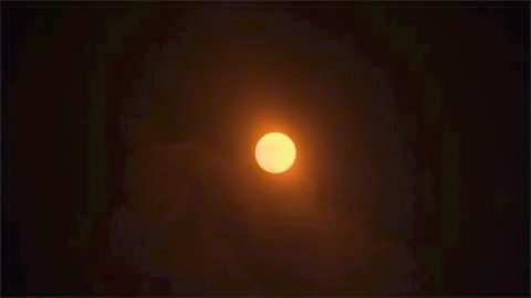 Cloudy View Post Eclipse. Stock Photos
