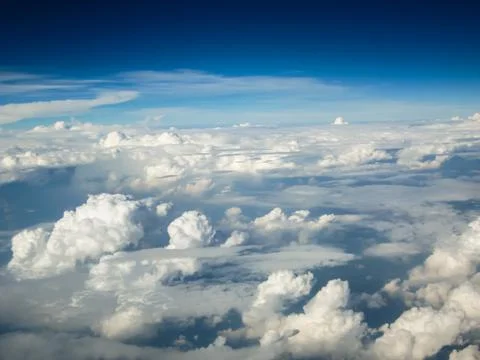 Cloudy view on sky from airplane Stock Photos
