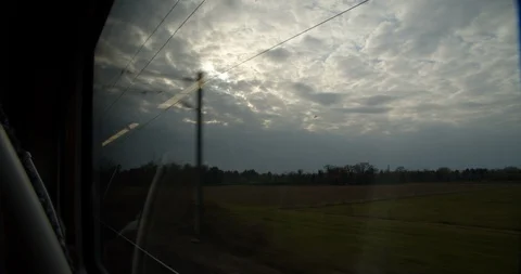 Cloudy view from a train window Stock Footage 123697115