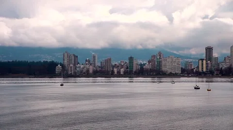 Cloudy Waterfront Cityscape Stock Footage 1078968