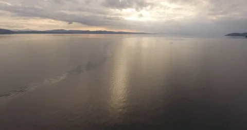 Cloudy Weather and Reflections over Sea Aerial Footage Stock Footage 121716052