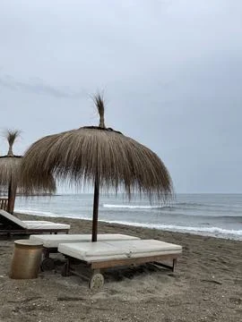 Cloudy weather on the beach Stock Photos