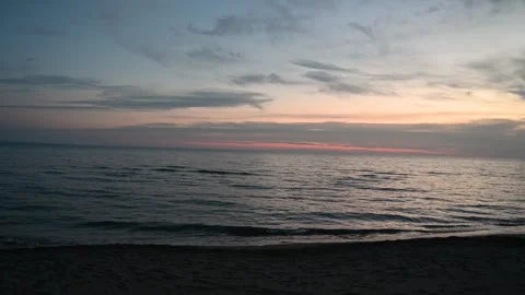 Cloudy weather. Clouds over the sea during sunset. Stock Footage 293210085
