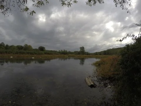 Cloudy weather with a gray sky of the Hackensack River in Teaneck, NJ Stock Photos