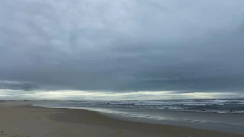 Cloudy weather on the ocean coast. Dramatic sky over the ocean. Dramatic ocean Stock Footage 307314685