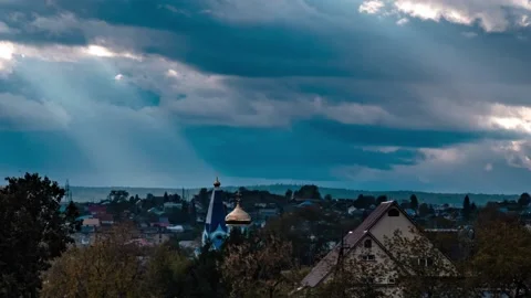Cloudy weather with rays through the clouds. Dramatic sky over the Russian Stock Footage 161144452