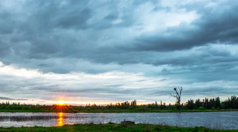 Cloudy Wetlands Sunset Timelapse Stock Footage 55881471