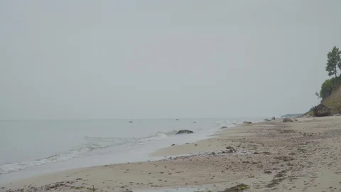 Cloudy windy day on a beach with sound Stock Footage 94369757