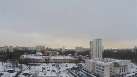 Cloudy winter day in the city timelapse Stock Footage 79807682