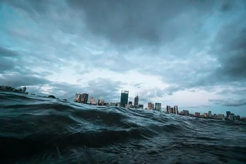 Cloudy winter day low view of Perth city skyline from South Perth foreshore Photos