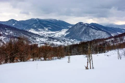Cloudy winter morning in mountains Stock Photos