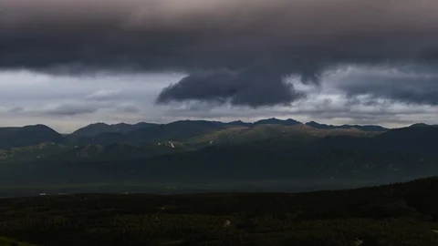 Cloudy Yukon mountain range 8K time lapse Stock Footage 111358061