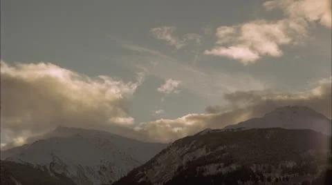 Cloudy,time lapse,snowy Mts.,Alaska Stock Footage 26657167