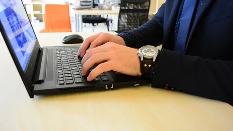 Clouse up of businessman's hand using keyboard. Video stock 90564900