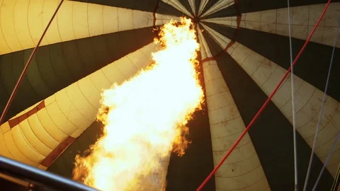 Clouse up of gas burner fire inside hot air balloon dome Stock Footage 113733132
