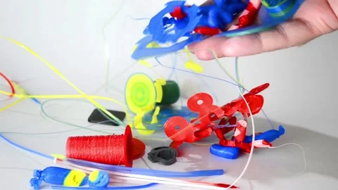 Clouse up of a pile of 3d printed plastic waste Stock Footage 168383809
