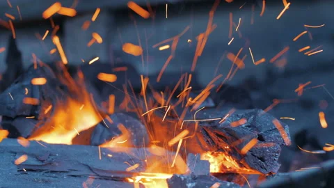 Clouse up sparks from a bonfire fly up Stock Footage 136667232