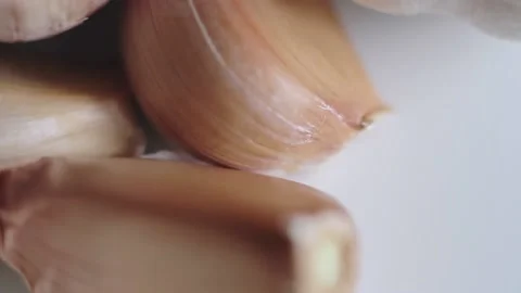 Clove of garlic at the kitchen Stock Footage 143781337