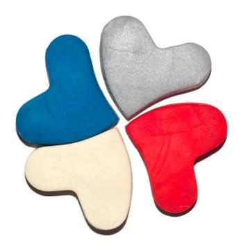 Clover colored hearts made from modelling clay. Stock Photos