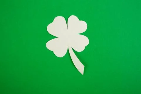 Clover leaf on green background. Stock Photos