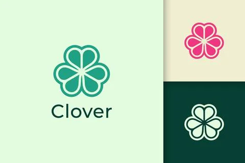 Clover leaf logo in abstract shape with green color represent lucky or herb Stock Illustration