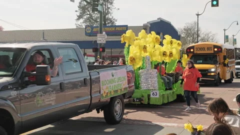 Clover Park School District pickup truck towing a yellow flower pa sammer egg 41 Stock Footage 339986635