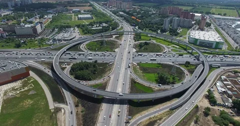 Cloverleaf intersection with circular overpass, aerial view Stock Footage 124621872