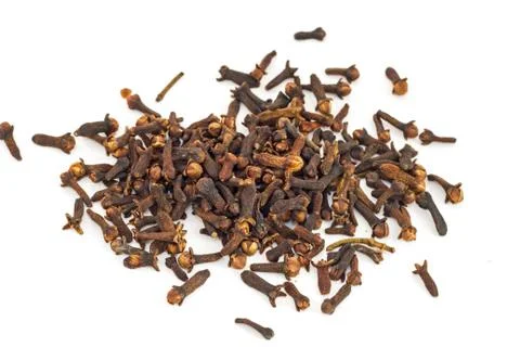 Cloves against white background Stock Photos