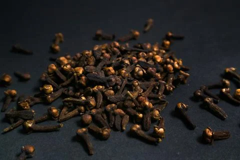 Cloves or cengkeh on black background, are used as a spicy cooking spice in.. Foto stock