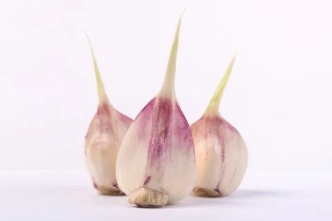 Cloves of young garlic Stock Photos