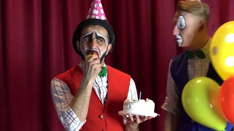 Clown lights the candle Stock Footage 85017759