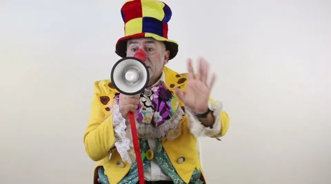 Clown with a megaphone on white background Stock Footage 61826132
