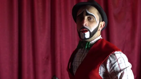 Clown with a pistol Stock-Footage 84673948