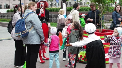 Clown Playing With the Children at the Fair Stock Footage 63129596