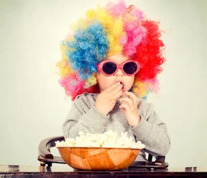 Clown with pop corn Stock Photos