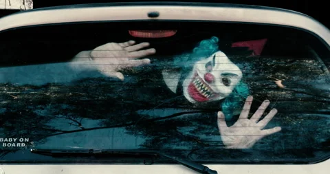 Clown Pressed Up against car window Stock Footage 273187767