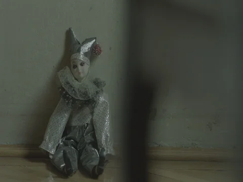Clown puppet thriller style sitting Stock Footage 71615625