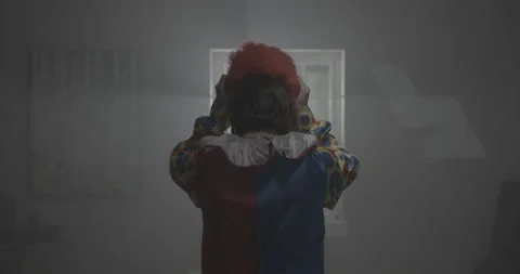 Clown Putting on Wig 스톡 동영상 237547027