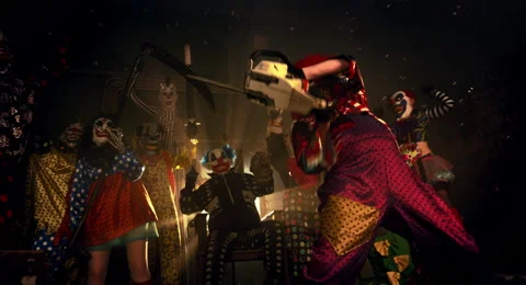 The clown in the red wig standing with a chainsaw. Vidéo 67871403