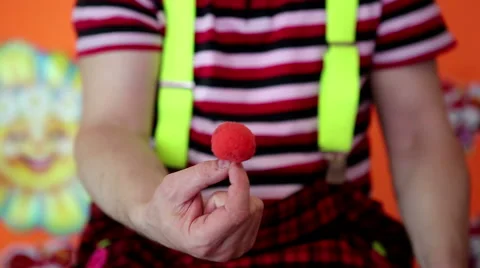 The clown shows a trick with the ball. Stock Footage 62740868