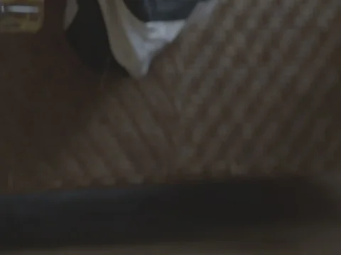 Clown's hand while sleeping cinema movie style Stock Footage 71615532