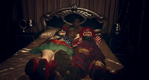 Clowns lying in bed. Video stock 67902516