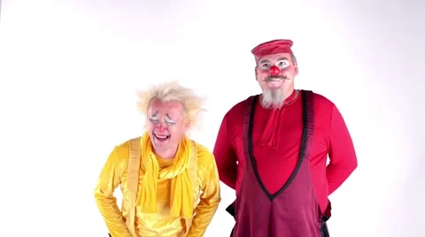 Clowns making the dog from a balloon Stock Footage 64477180
