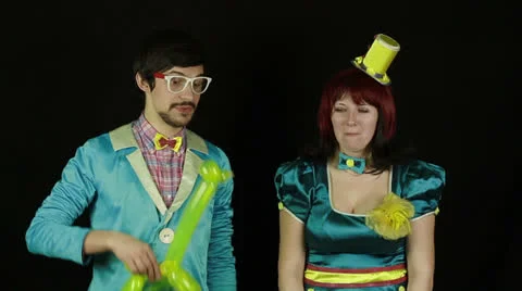 Clowns show presentation on a black background Stock Footage 22714677
