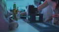 Club guests buying drinks at bar counter, paying by card HD Footage