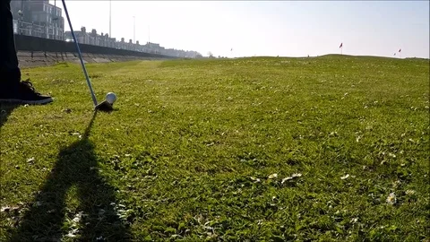 A club hitting a golf ball Stock Footage 77863489