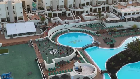 Club La Santa Pool Area Lanzarote with Surfers, Loungers and Dance Class Stock Footage 344023341