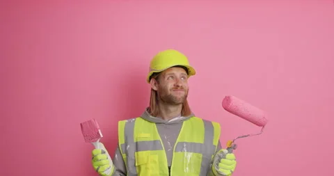Clueless bearded man focused above on ceiling tries to choose paint for room Stock Footage 155862450